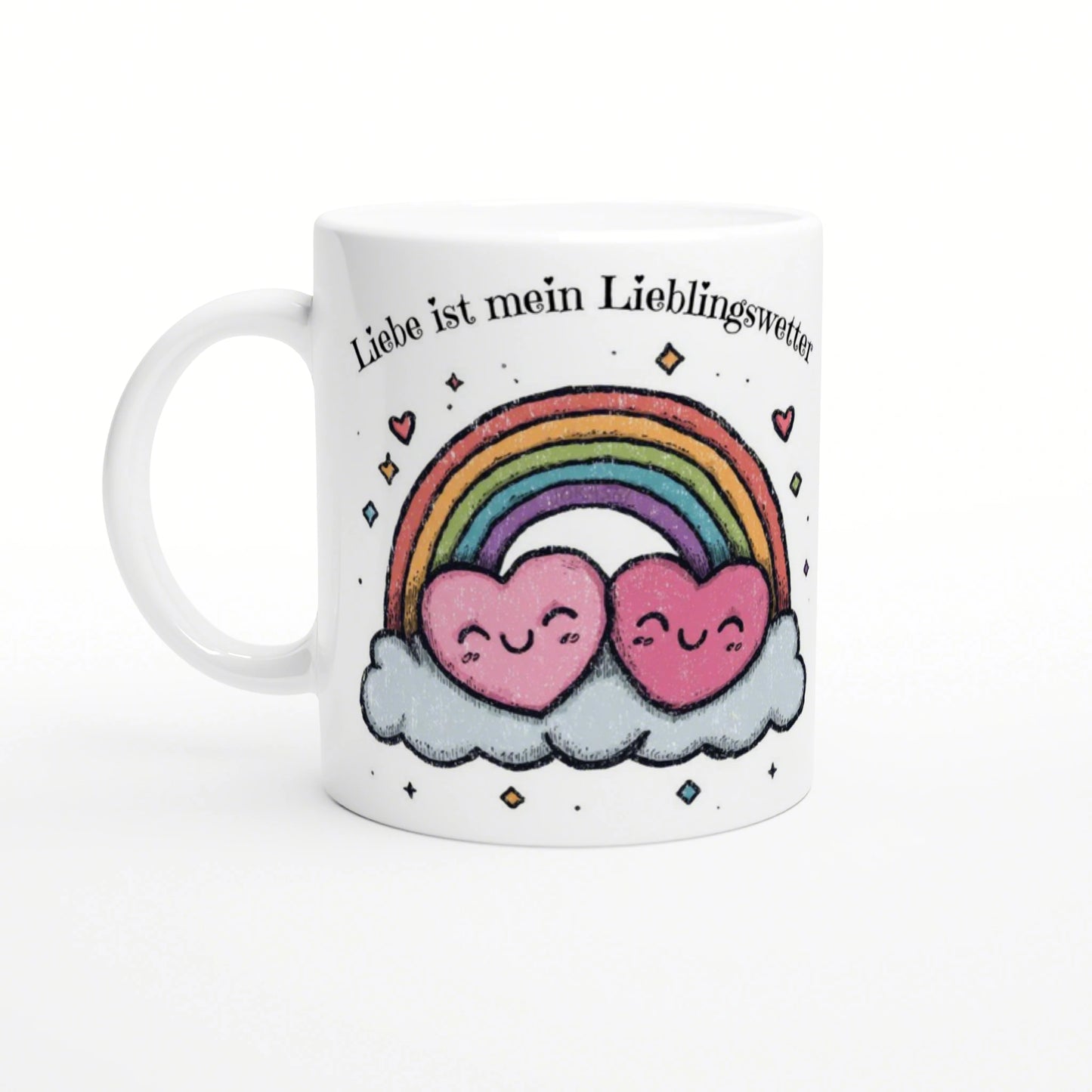 White mug mockup with two pink hearts on a cloud under a rainbow and the German slogan Liebe ist mein Lieblingswetter.