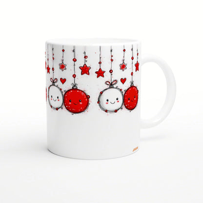 White mug featuring a whimsical doodle-style design of hanging red-and-white ornaments with smiling faces, stars, and hearts.