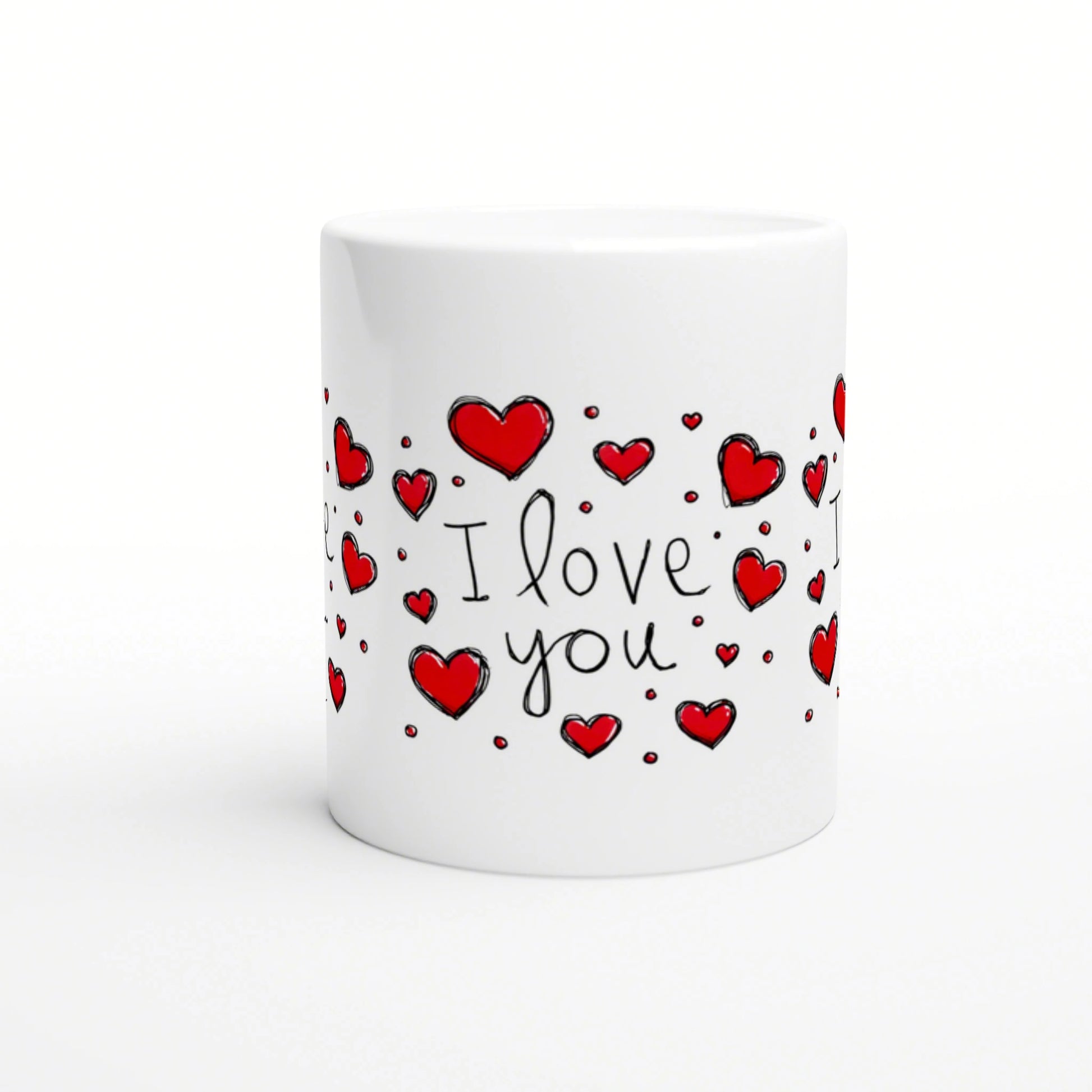 White ceramic mug featuring hand-drawn red hearts and the words I love you in black script.